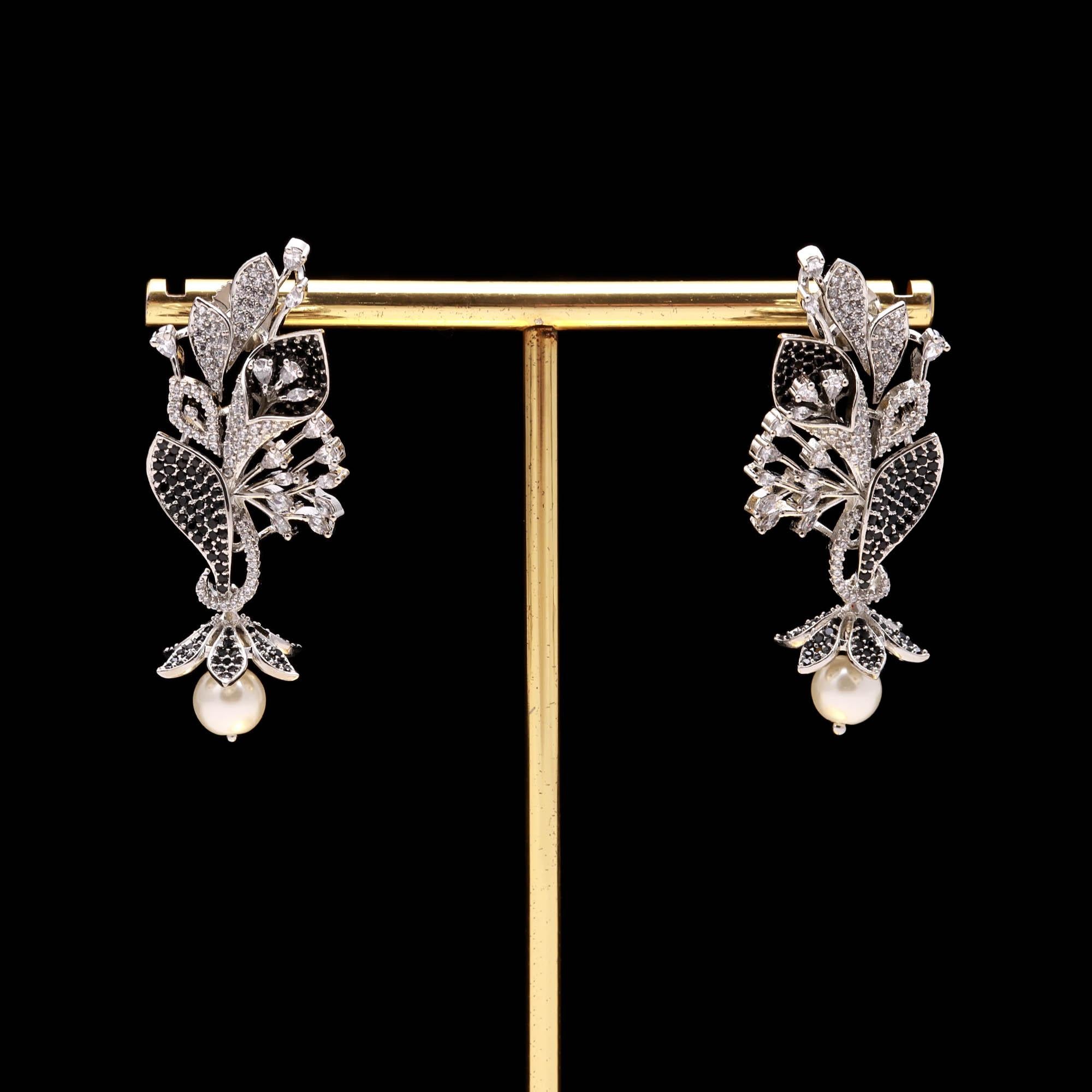 Luxury Black and White American Diamond (AD) Floral Pearl Dangler Earrings - Haamsi