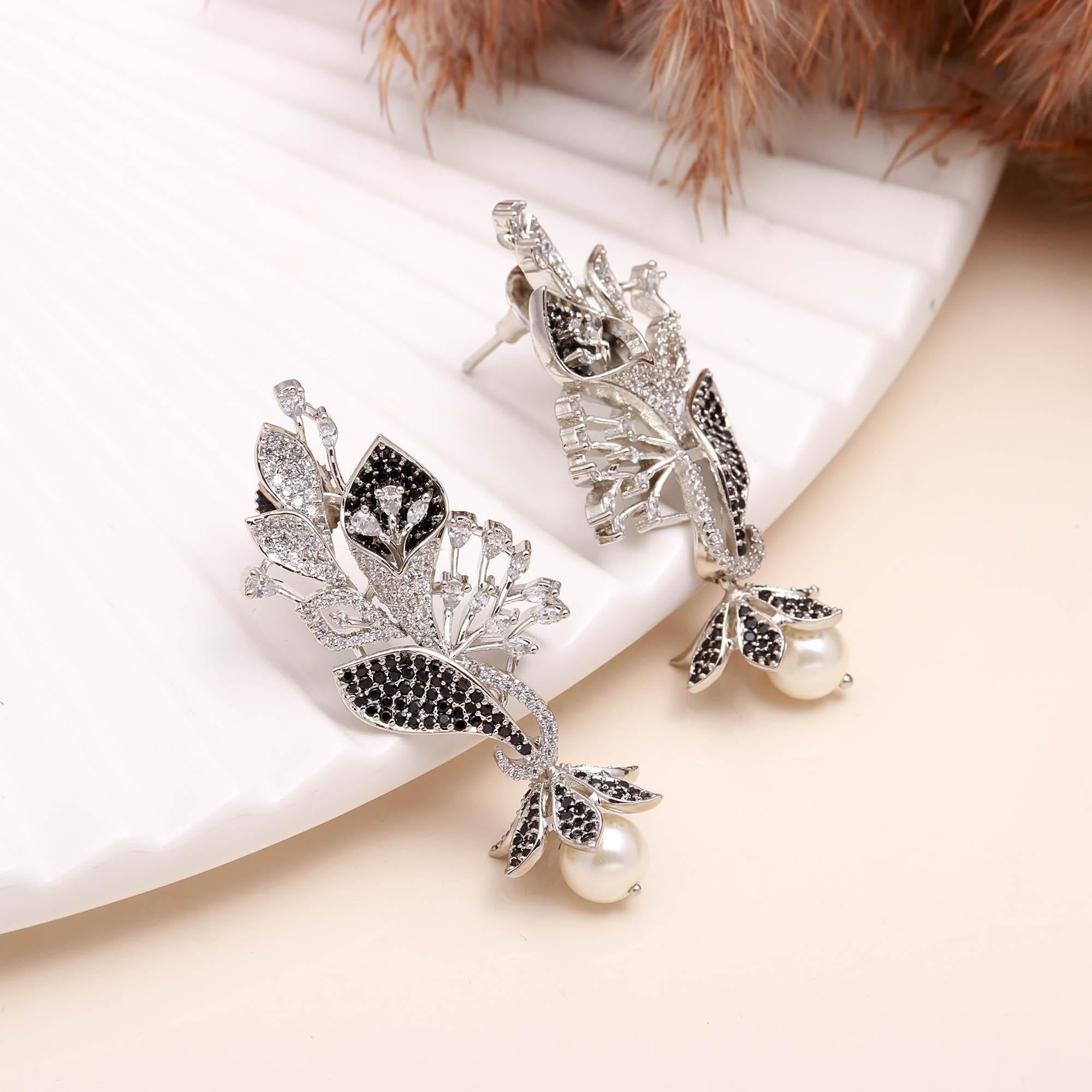 Luxury Black and White American Diamond (AD) Floral Pearl Dangler Earrings - Haamsi