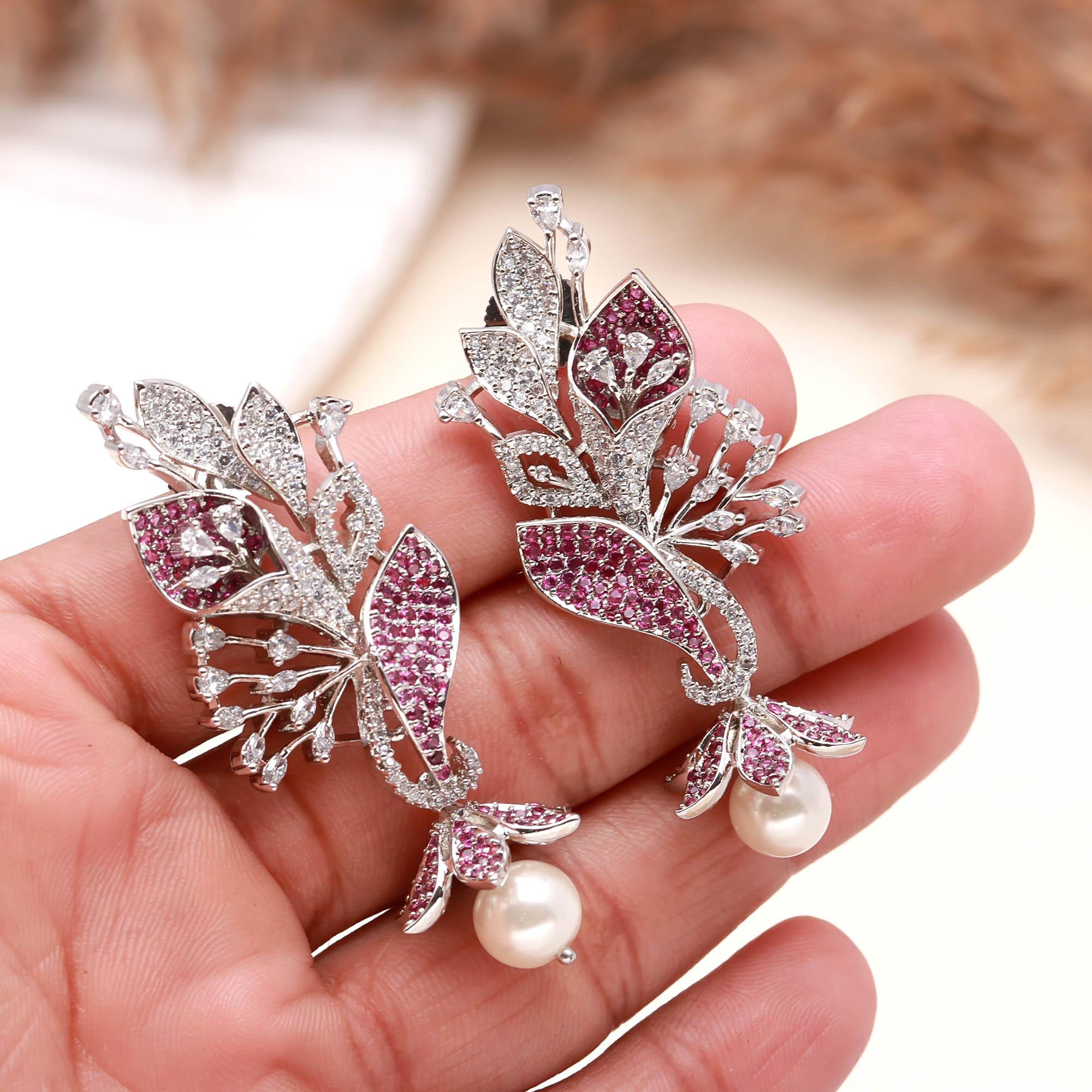 Luxury Black and White American Diamond (AD) Floral Pearl Dangler Earrings - Haamsi