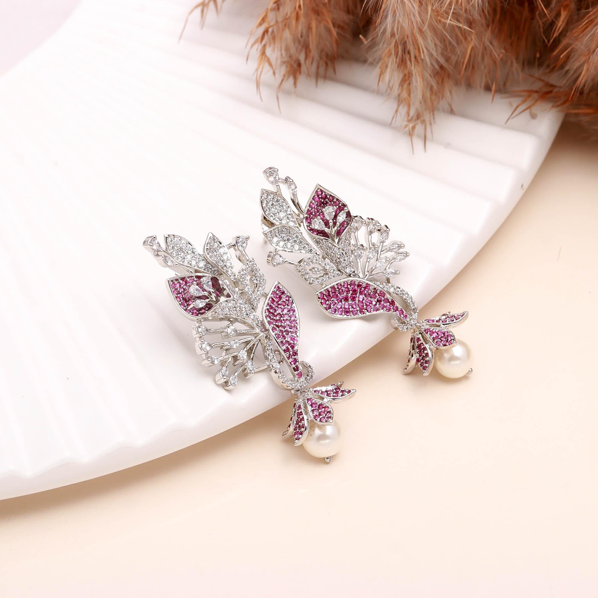 Luxury Black and White American Diamond (AD) Floral Pearl Dangler Earrings - Haamsi